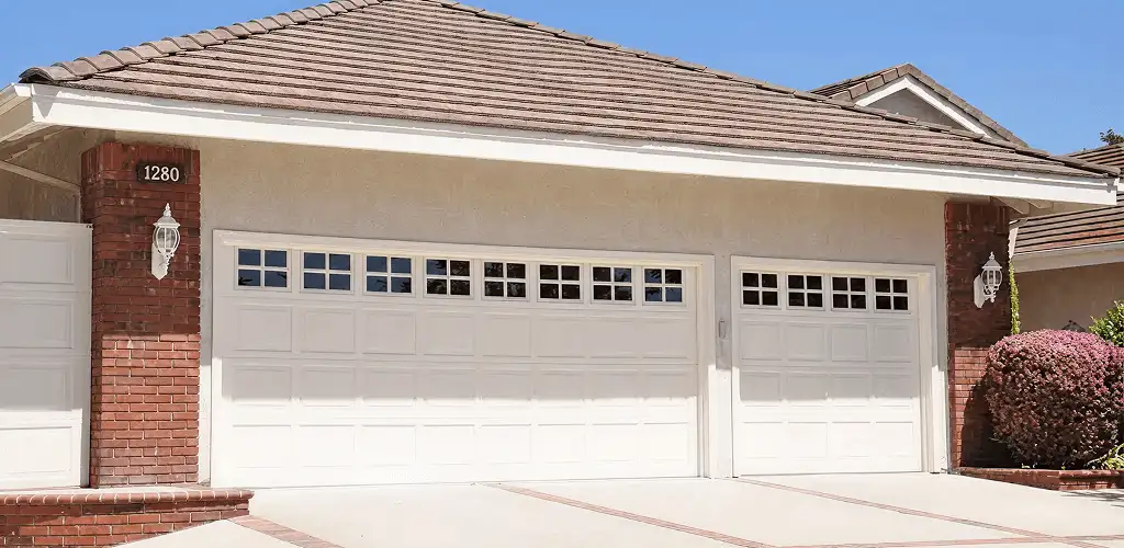 Residential garage door repair service for a double garage door in Lakeland, FL