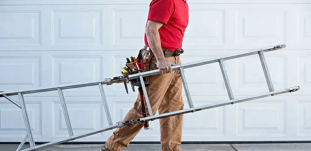 Garage door repair technician arriving with tools and ladder in Lakeland, FL