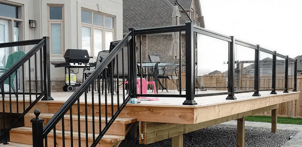 Handrail installation on a deck staircase for safety and code compliance in Lakeland, FL